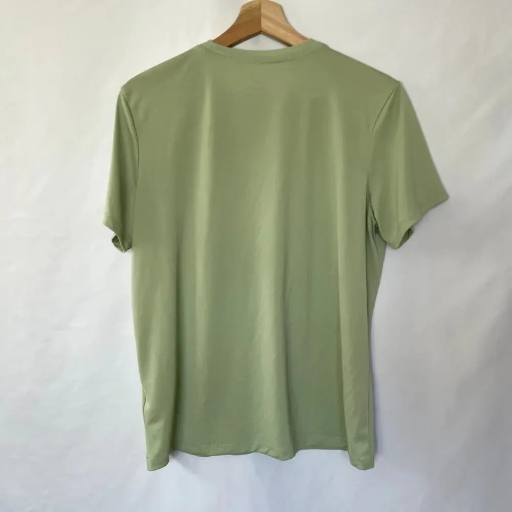 The Nike Tee dri-fit green short sleeved shirt men's size medium athletic top